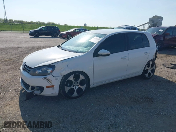 2013 Volkswagen Golf TDI z VIN WVWDM7AJ9DW138502, wystawiony jako IAAI lot #42115604 z przebiegiem 133 888 mil mil oraz . Historia ofert i sprzedaży dostępna na DreamBid. Obrazek 2.