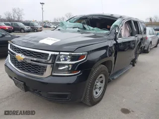 2017 Chevrolet Tahoe Commercial with VIN 1GNSKFEC3HR201575, listed as a IAAI auction lot 40974289 with 144,463 mi miles. Bid and sale history available at carsss.com. Image 2.