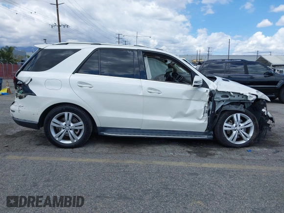 2015 Mercedes-Benz M 350 with VIN 4JGDA5JB9FA518473, listed as a IAAI auction lot 41947228 with 93,918 mi miles and . Bid and sale history available at DreamBid. Image 14.