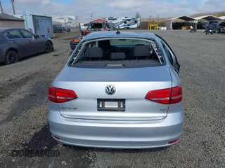 2015 Volkswagen Jetta Sedan 1.8T SE with VIN 3VWD17AJ3FM297573, listed as a IAAI auction lot 41884541 with 98,225 mi miles. Bid and sale history available at carsss.com. Image 16.