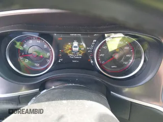 2021 Dodge Charger SXT with VIN 2C3CDXBG5MH605867, listed as a IAAI auction lot 41682336 with 56,660 mi miles and . Bid and sale history available at DreamBid. Image 7.