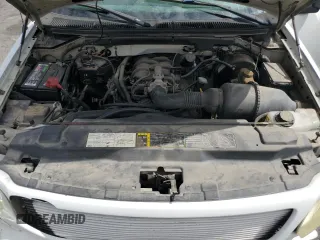2004 Ford F-150 XL with VIN 2FTRF17294CA59985, listed as a Copart auction lot 55296195 with 220,933 mi miles and Salvage title. Bid and sale history available at DreamBid. Image 11.