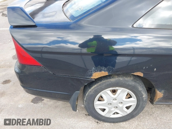 2003 Honda Civic LX with VIN 1HGEM215X3L063448, listed as a IAAI auction lot 41724344 with Not Provided miles and . Bid and sale history available at DreamBid. Image 12.