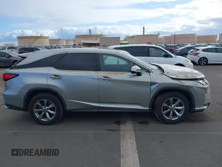 2019 Lexus RX 350L Premium z VIN JTJGZKCA3K2011521, wystawiony jako IAAI lot #41504654 z przebiegiem 37 761 mil mil oraz . Historia ofert i sprzedaży dostępna na DreamBid. Obrazek 13.