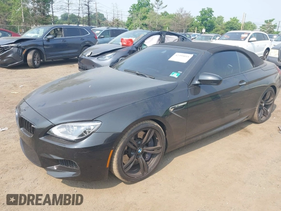 2014 BMW M6 z VIN WBSLZ9C5XEDZ78402, wystawiony jako IAAI lot #42399055 z przebiegiem 127 803 mil mil oraz . Historia ofert i sprzedaży dostępna na DreamBid. Obrazek 17.