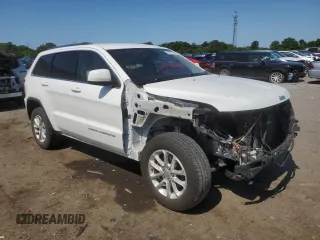 2016 Jeep Grand Cherokee Laredo with VIN 1C4RJEAG4GC500524, listed as a Copart auction lot 61613725 with 122,467 mi miles and Salvage title. Bid and sale history available at DreamBid. Image 4.