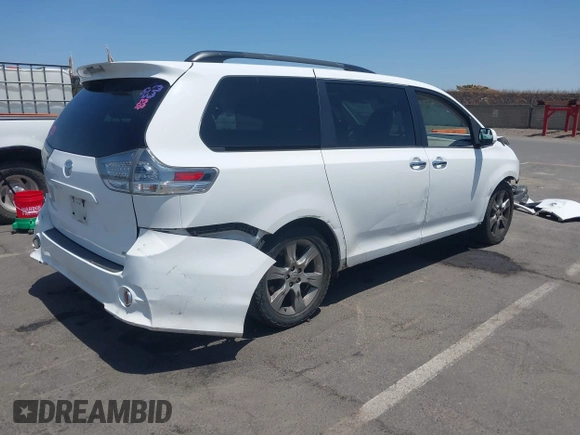 2014 Toyota Sienna SE z VIN 5TDXK3DC0ES515325, wystawiony jako IAAI lot #42520007 z przebiegiem 155 649 mil mil oraz . Historia ofert i sprzedaży dostępna na DreamBid. Obrazek 4.