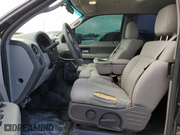 2006 Ford F-150 STX with VIN 1FTRX12W46KC19017, listed as a Copart auction lot 60231105 with 211,864 mi miles and Salvage title. Bid and sale history available at DreamBid. Image 7.