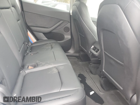 2023 Tesla Model Y Long Range with VIN 7SAYGDEE0PF746778, listed as a Copart auction lot 52704965 with 19,047 mi miles and Salvage Title. Bid and sale history available at DreamBid. Image 10.