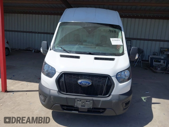 2022 Ford Transit Cargo with VIN 1FTBW3X89NKA69141, listed as a IAAI auction lot 41980864 with 102,721 mi miles and . Bid and sale history available at DreamBid. Image 12.