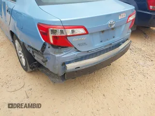 2013 Toyota Camry L with VIN 4T1BF1FK0DU694866, listed as a IAAI auction lot 42096028 with 260,525 mi miles and . Bid and sale history available at DreamBid. Image 19.