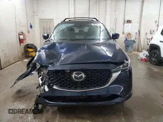 2023 Mazda CX-5 Signature with VIN JM3KFBXY9P0122887, listed as a Copart auction lot 88993465 with 12,116 mi miles and Salvage Title. Bid and sale history available at carsss.com. Image 5.