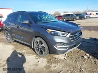 2018 Hyundai Tucson Value with VIN KM8J33A27JU749722, listed as a IAAI auction lot 41220859 with 58,599 mi miles. Bid and sale history available at carsss.com. Image 1.