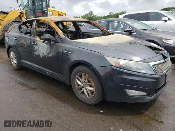 2013 Kia Optima LX z VIN 5XXGM4A72DG221738, wystawiony jako Copart lot #58740985 z przebiegiem Nie podano mil oraz Szkoda całkowita • Salvage title. Historia ofert i sprzedaży dostępna na DreamBid. Obrazek 4.