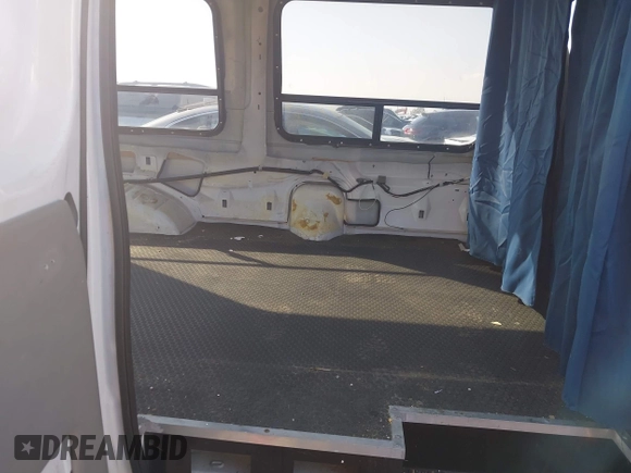 2007 Ford Econoline Cargo Commercial with VIN 1FTNS24W47DB08151, listed as a IAAI auction lot 41449205 with 638,815 mi miles and . Bid and sale history available at DreamBid. Image 8.