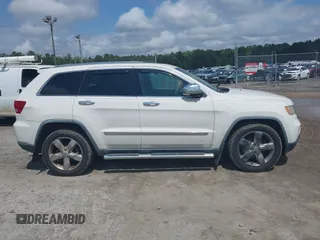 2012 Jeep Grand Cherokee Overland with VIN 1C4RJECT8CC195064, listed as a IAAI auction lot 41860187 with 241,367 mi miles. Bid and sale history available at carsss.com. Image 13.