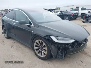 2020 Tesla Model X P90D with VIN 5YJXCDE43LF301540, listed as a IAAI auction lot 41571611 with 53,591 mi miles. Bid and sale history available at carsss.com. Image 1.