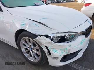 2018 BMW 3 Series 320i with VIN WBA8E1G54JNU90990, listed as a IAAI auction lot 41801197 with 140,603 mi miles. Bid and sale history available at carsss.com. Image 6.