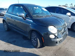 2012 FIAT 500 Lounge z VIN 3C3CFFCR5CT287694, wystawiony jako IAAI lot #41734193 z przebiegiem 166 048 mil mil oraz . Historia ofert i sprzedaży dostępna na DreamBid. Obrazek 1.