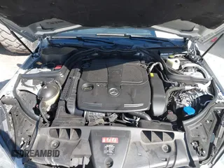 2014 Mercedes-Benz E-Class E 350 with VIN WDDKJ8JB2EF237510, listed as a IAAI auction lot 42122701 with 137,649 mi miles. Bid and sale history available at carsss.com. Image 10.
