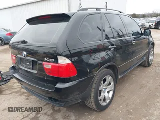 2002 BMW X5 4.4i with VIN 5UXFB33582LH31341, listed as a IAAI auction lot 41548139 with 82,188 mi miles. Bid and sale history available at carsss.com. Image 4.