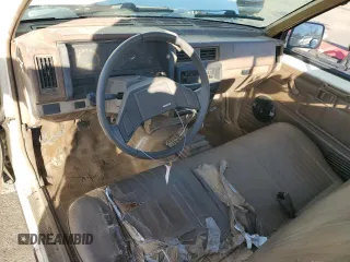 1987 Nissan Hardbody E z VIN JN6ND11S4HW011430, wystawiony jako Copart lot #81785214 z przebiegiem 334 566 mil mil oraz Tytuł czysty. Historia ofert i sprzedaży dostępna na DreamBid. Obrazek 8.