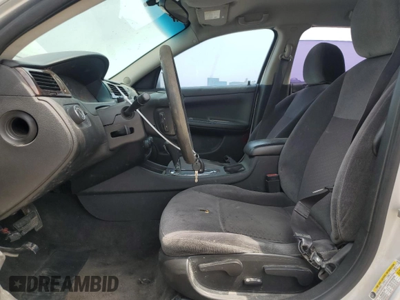 2012 Chevrolet Impala LS Fleet with VIN 2G1WF5E37C1327280, listed as a Copart auction lot 59036775 with 135,310 mi miles and Salvage title. Bid and sale history available at DreamBid. Image 7.