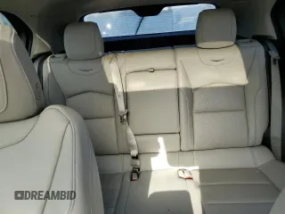 2021 Cadillac XT4 FWD Premium Luxury z VIN 1GYFZCR48MF056210, wystawiony jako Copart lot #73706384 z przebiegiem Nie podano mil oraz Nie do naprawy • Non repairable. Historia ofert i sprzedaży dostępna na DreamBid. Obrazek 10.