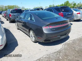 2015 Lincoln MKZ z VIN 3LN6L2G93FR607192, wystawiony jako IAAI lot #42226377 z przebiegiem 74 018 mil mil oraz . Historia ofert i sprzedaży dostępna na DreamBid. Obrazek 3.