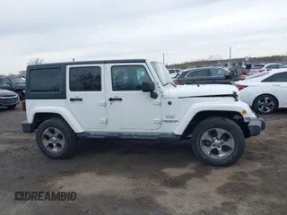 2017 Jeep Wrangler Unlimited Sahara z VIN 1C4BJWEG2HL695672, wystawiony jako IAAI lot #42008396 z przebiegiem 56 028 mil mil oraz . Historia ofert i sprzedaży dostępna na DreamBid. Obrazek 13.