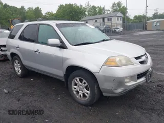 2004 Acura MDX Touring with VIN 2HNYD18874H537189, listed as a IAAI auction lot 42495400 with 194,834 mi miles and . Bid and sale history available at DreamBid. Image 1.