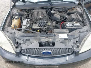 2005 Ford Taurus SE z VIN 1FAHP53U75A109055, wystawiony jako IAAI lot #42401043 z przebiegiem Nie podano mil oraz . Historia ofert i sprzedaży dostępna na DreamBid. Obrazek 10.