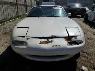 1990 Mazda MX-5 Miata z VIN JM1NA3511L0106323, wystawiony jako Copart lot #50449685 z przebiegiem 179 018 mil mil oraz Szkoda całkowita • Salvage title. Historia ofert i sprzedaży dostępna na DreamBid. Obrazek 5.