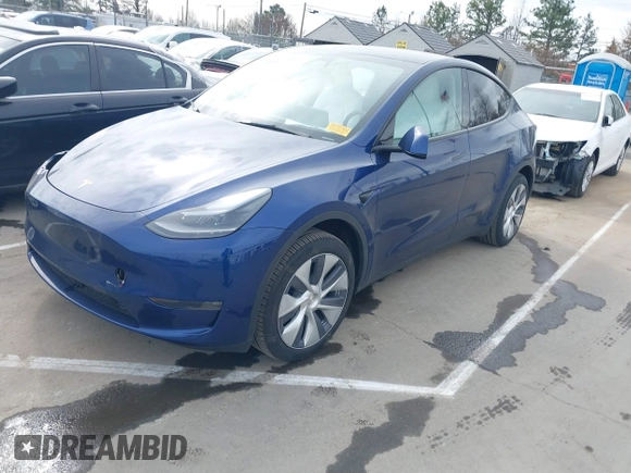 2024 Tesla Model Y Long Range z VIN 7SAYGDEE9RA244657, wystawiony jako IAAI lot #41694621 z przebiegiem 12 991 mil mil oraz . Historia ofert i sprzedaży dostępna na DreamBid. Obrazek 2.