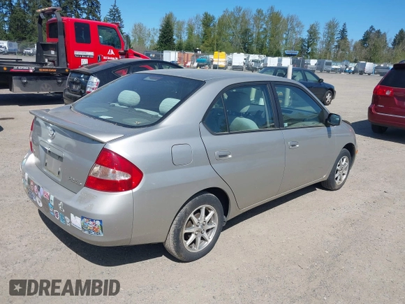 2003 Toyota Prius with VIN JT2BK18U630086718, listed as a IAAI auction lot 42036644 with 251,852 mi miles. Bid and sale history available at carsss.com. Image 4.