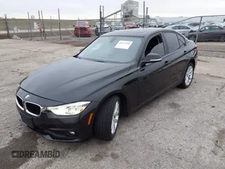 2018 BMW 3 Series 320i with VIN WBA8E1G56JNU91008, listed as a IAAI auction lot 41247490 with 57,434 mi miles. Bid and sale history available at carsss.com. Image 2.