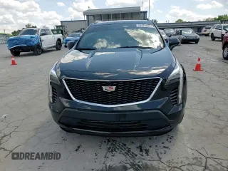 2020 Cadillac XT4 FWD Sport with VIN 1GYFZER48LF012489, listed as a Copart auction lot 54434025 with 74,249 mi miles and Salvage title. Bid and sale history available at DreamBid. Image 14.