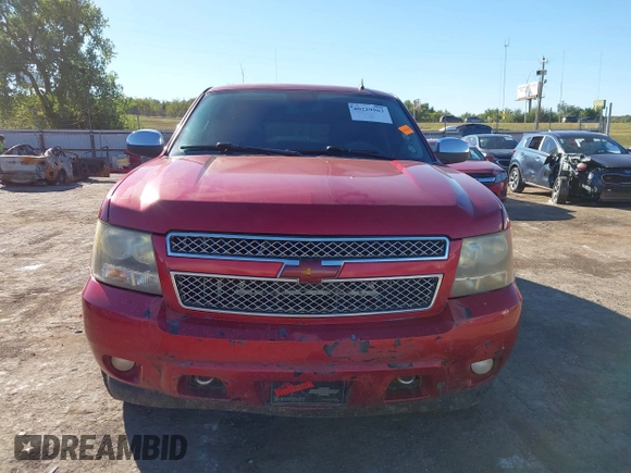 2012 Chevrolet Suburban LS with VIN 1GNSCHE08CR327180, listed as a IAAI auction lot 40229963 with 235,469 mi miles. Bid and sale history available at carsss.com. Image 12.