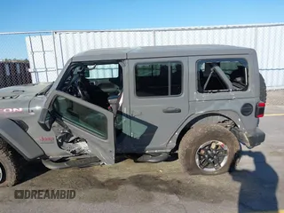 2020 Jeep Wrangler Unlimited Rubicon with VIN 1C4HJXFN4LW136516, listed as a IAAI auction lot 41874403 with 87,576 mi miles. Bid and sale history available at carsss.com. Image 6.