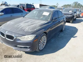 2014 BMW 3 Series 335i with VIN WBA3A9C54EF477943, listed as a IAAI auction lot 41632554 with 102,273 mi miles. Bid and sale history available at carsss.com. Image 17.