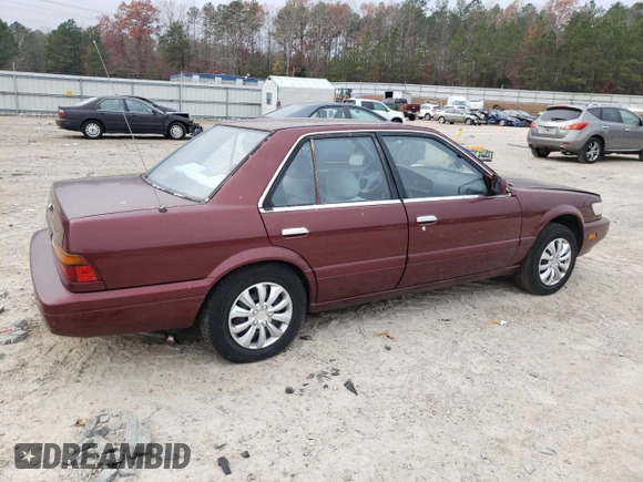 1992 Nissan Stanza GXE с VIN JN1FU21P3NX909177, выставлен на аукционе Copart как лот 83811334 с пробегом 67 101 миль миль и Списание • Salvage title. История ставок и продаж доступна на DreamBid. Изображение 3.
