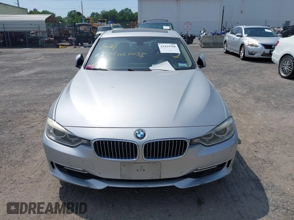 2013 BMW 3 Series 335i xDrive with VIN WBA3B9G57DNP39692, listed as a IAAI auction lot 42424788 with Not provided miles and . Bid and sale history available at DreamBid. Image 11.