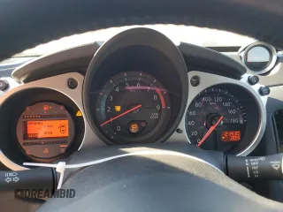2014 Nissan 370Z Nismo with VIN JN1AZ4EH6EM633797, listed as a Copart auction lot 87879675 with 21,410 mi miles and Salvage Title. Bid and sale history available at DreamBid. Image 9.