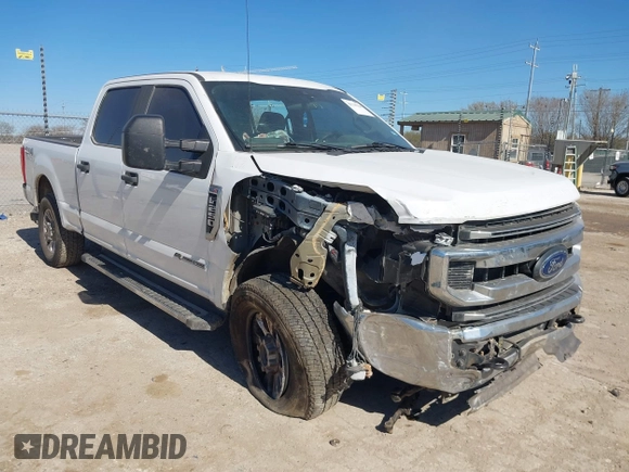 2021 Ford Super Duty F-250 SRW XL with VIN 1FT7W2BT2MEC37128, listed as a IAAI auction lot 41735304 with 103,992 mi miles. Bid and sale history available at carsss.com. Image 1.