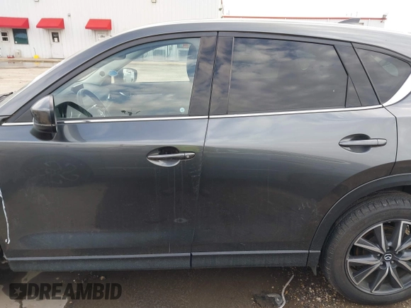 2018 Mazda CX-5 Grand Touring with VIN JM3KFBDM8J0441867, listed as a IAAI auction lot 41565147 with 62,466 mi miles. Bid and sale history available at carsss.com. Image 15.
