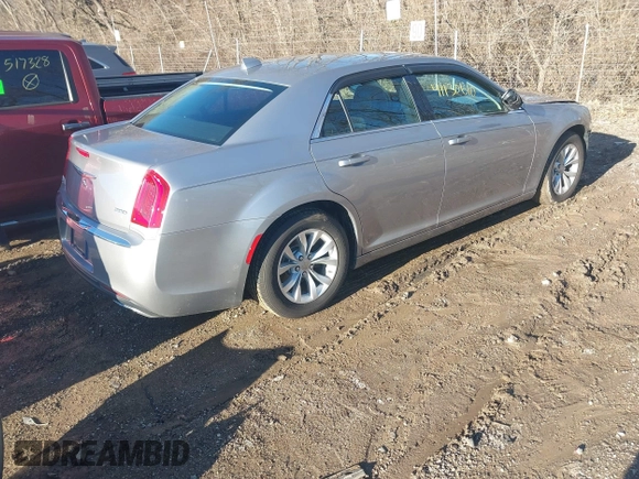 2016 Chrysler 300 Limited with VIN 2C3CCAAGXGH212405, listed as a IAAI auction lot 41130610 with 106,189 mi miles. Bid and sale history available at carsss.com. Image 4.
