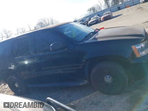 2012 Chevrolet Tahoe Commercial with VIN 1GNLC2E04CR191339, listed as a IAAI auction lot 41642943 with 152,941 mi miles and . Bid and sale history available at DreamBid. Image 13.