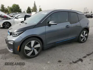 2018 BMW i3 with VIN WBY7Z2C55JVE64933, listed as a Copart auction lot 62085683 with 47,998 mi miles. Bid and sale history available at carsss.com. Image 1.