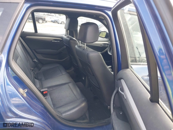 2014 BMW X1 xDrive28i with VIN WBAVL1C58EVY24491, listed as a IAAI auction lot 42022672 with 115,123 mi miles. Bid and sale history available at carsss.com. Image 8.