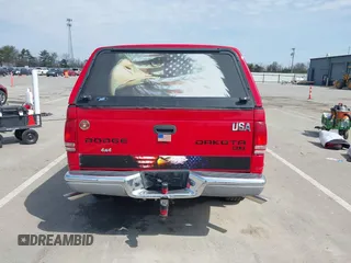 2003 Dodge Dakota z VIN 1D7HG42X93S296117, wystawiony jako IAAI lot #42045149 z przebiegiem 161 725 mil mil oraz . Historia ofert i sprzedaży dostępna na DreamBid. Obrazek 16.